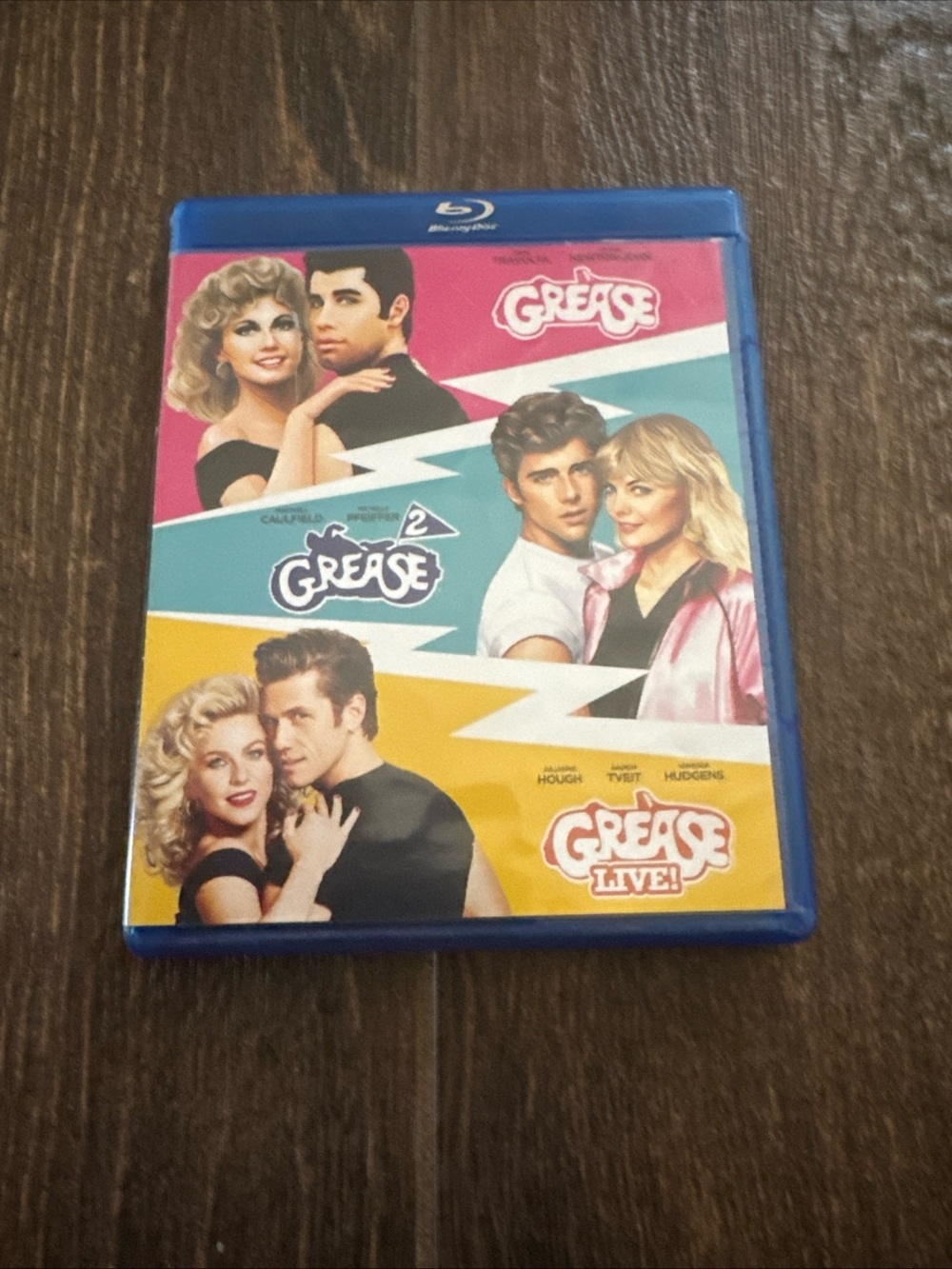 Grease Trilogy Blu-ray Set - Pink, Teal, Yellow Cover